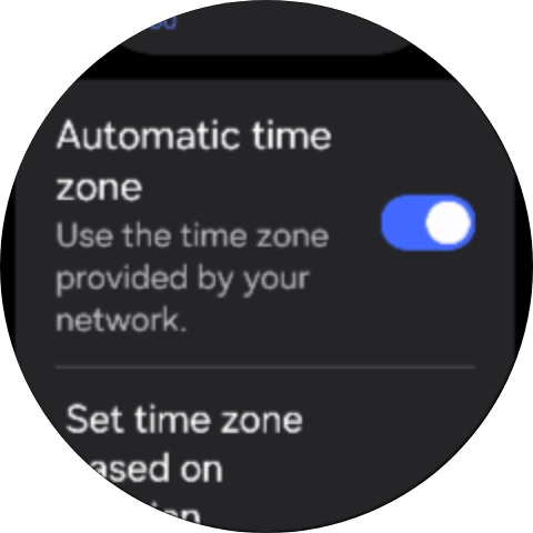 Press the indicator next to 'Automatic time zone' to turn off the function.