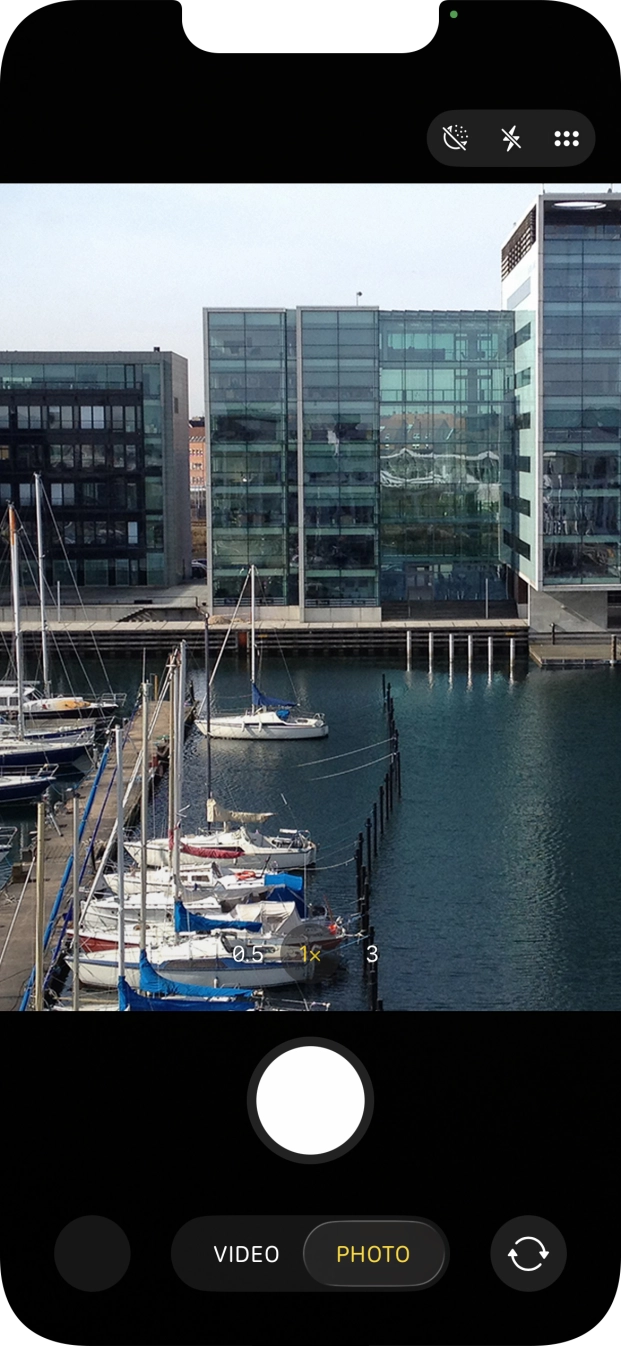 Slide your finger right or left on the screen to select the required camera mode. Slide your finger right or left on the screen to select the required camera mode.