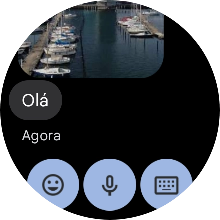 Prima o ícone de microfone.