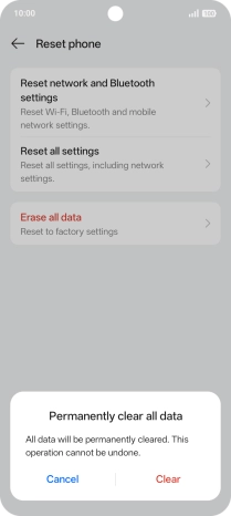 Press Clear. Wait a moment while the factory default settings are restored. Follow the instructions on the screen to set up your phone and prepare it for use.