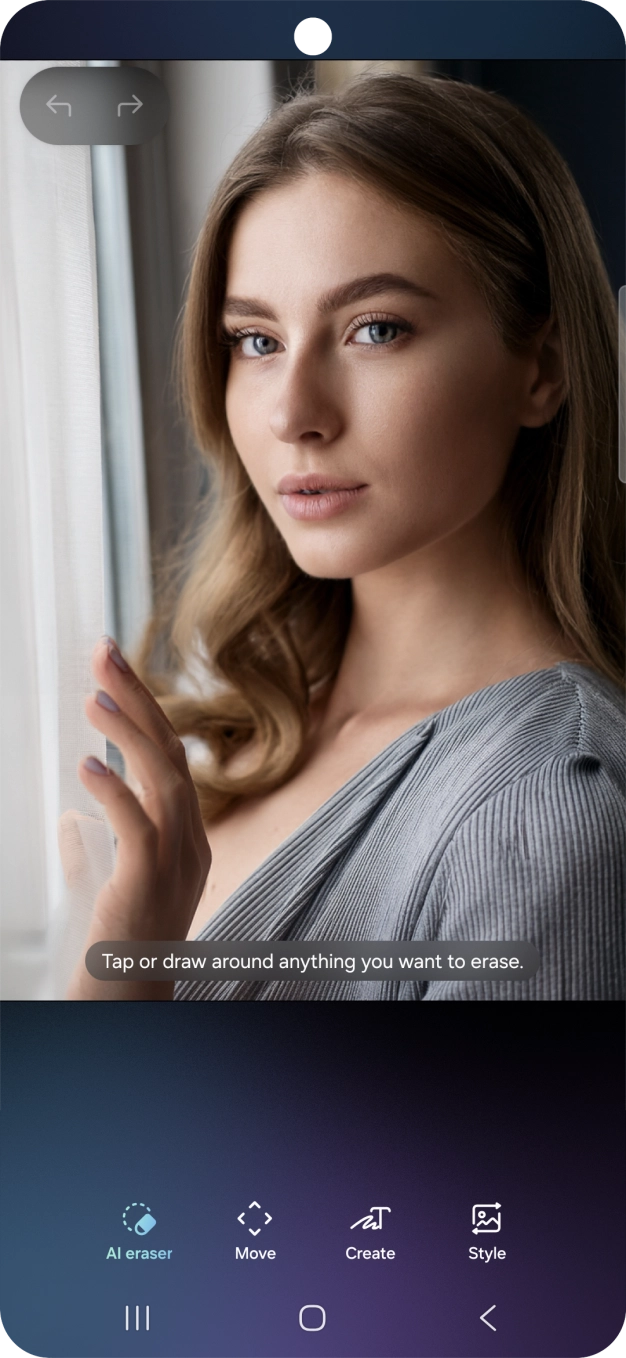 To remove objects from your picture, press AI eraser and follow the instructions on the screen to use the function. To remove objects from your picture, press AI eraser and follow the instructions on the screen to use the function.