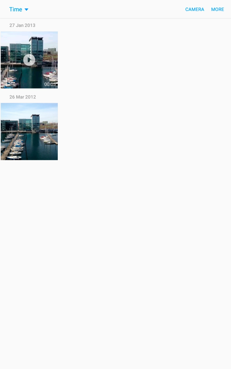 Press and hold the required picture or video clip. Press and hold the required picture or video clip.