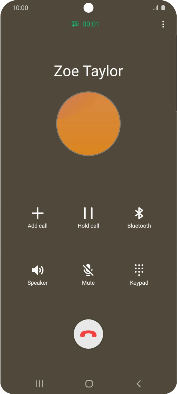 Press the end call icon.