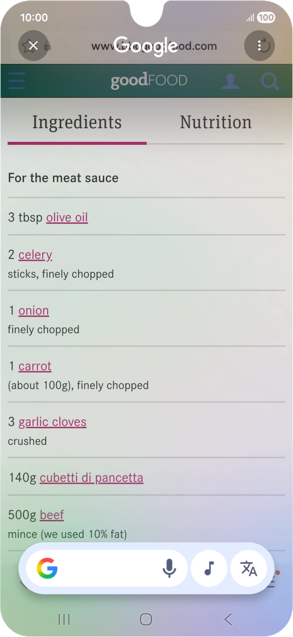 Prima o ícone de traduzir.