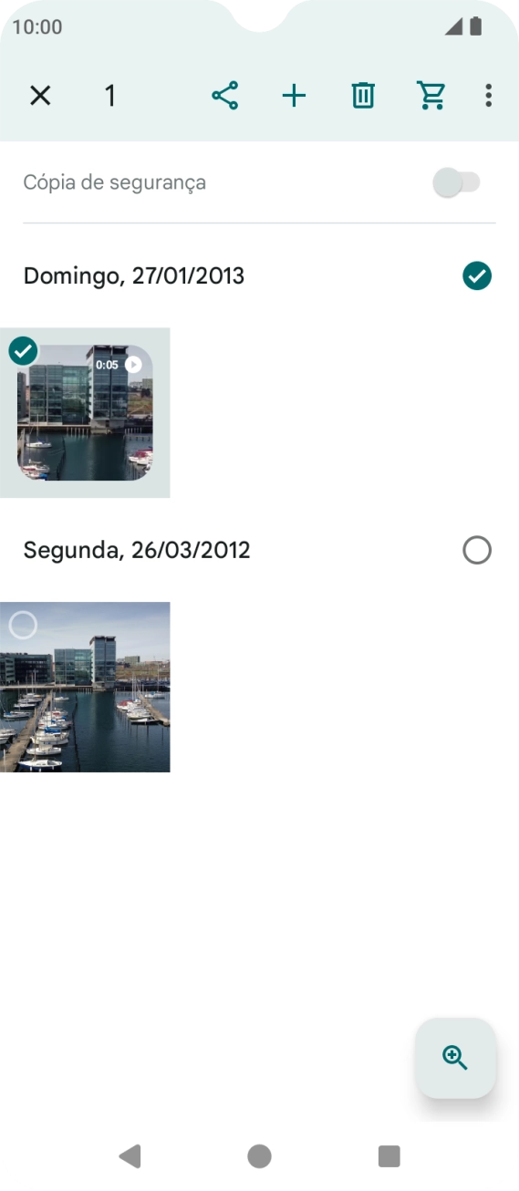 Prima as imagens ou vídeos pretendidos para os adicionar.