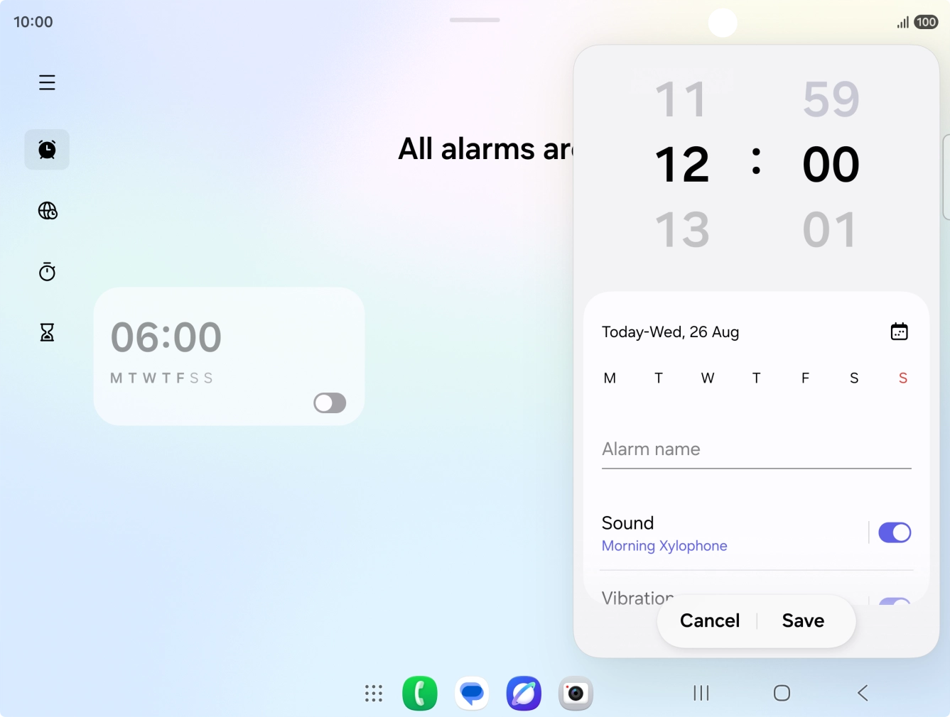 Slide your finger up or down on the hour and minute numbers to set the required alarm time.