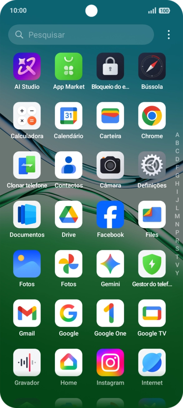 Prima Fotos e vá até à pasta pretendida.