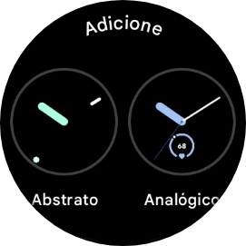 Deslize o dedo para cima no ecrã, para ver os mostradores de relógio disponíveis.