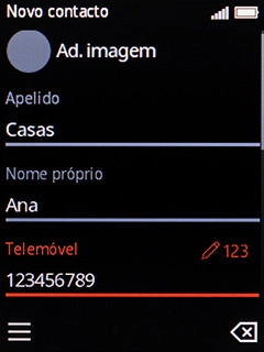 Prima a tecla de seleção esquerda.