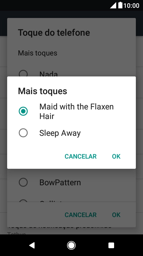 Quando tiver encontrado o tom de toque que pretende, prima OK.