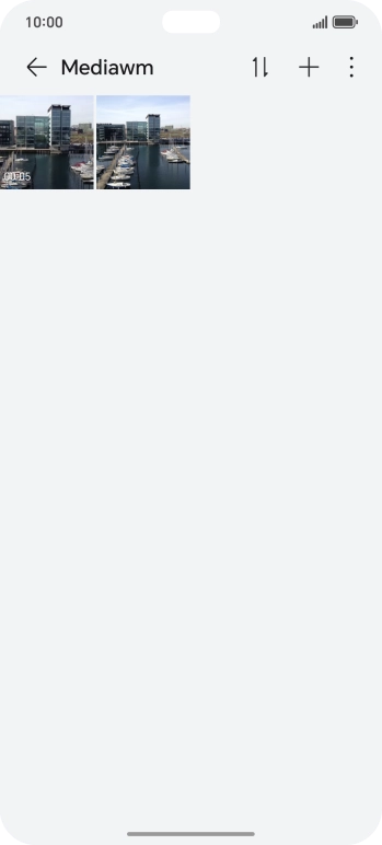 Press and hold any picture or video.