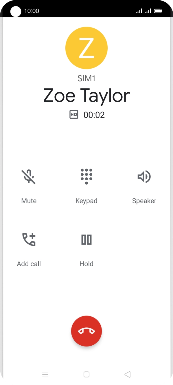 Press the end call icon.