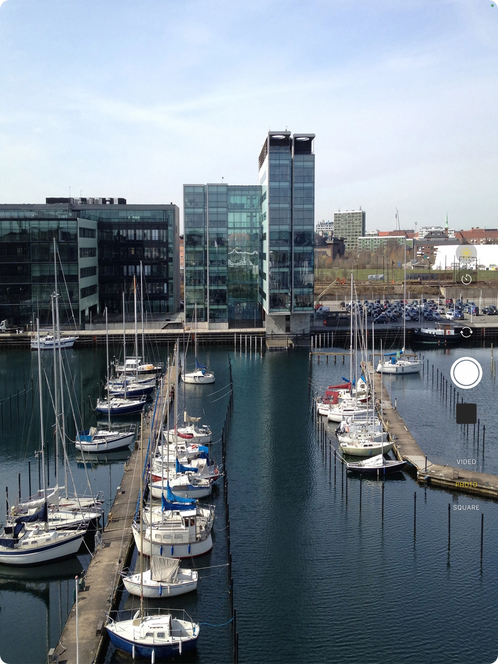 Slide your finger up or down on the screen to select the required camera mode.