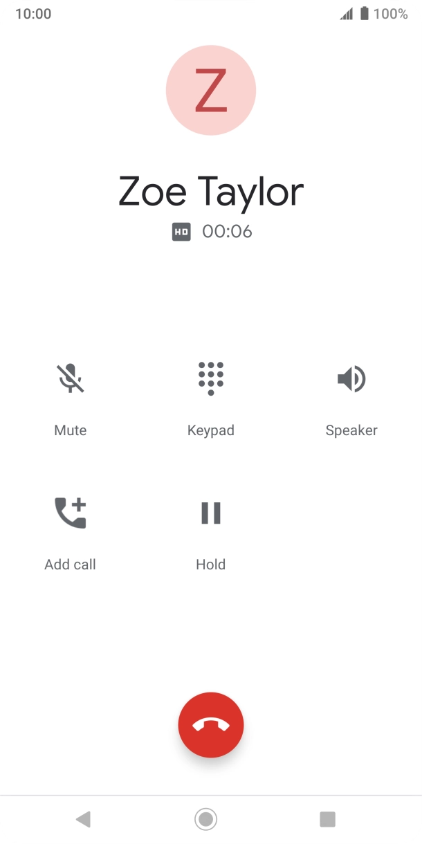 Press the end call icon.