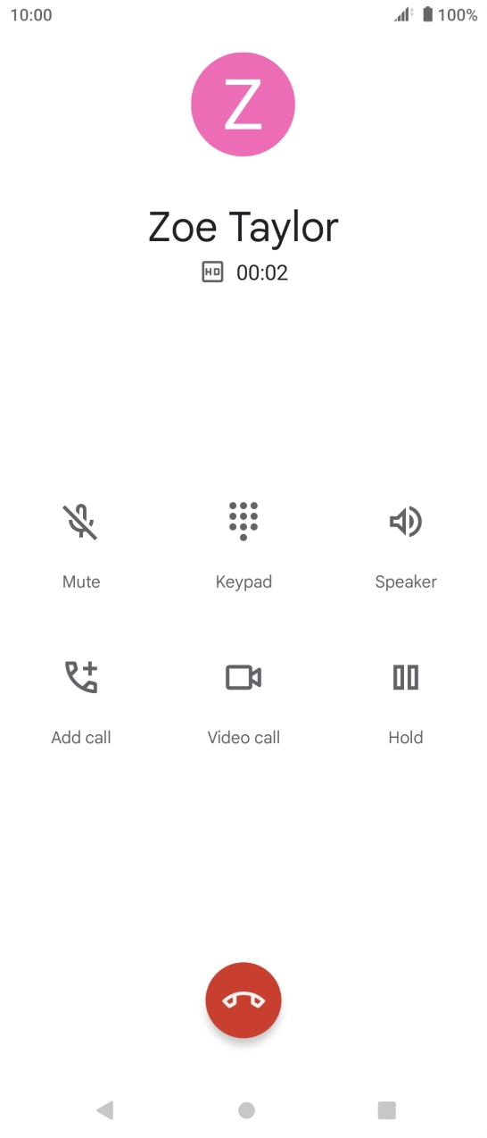 Press the end call icon.