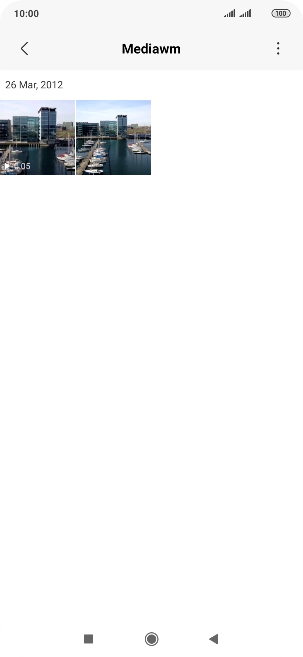 Press and hold any picture or video clip. Press and hold any picture or video clip.