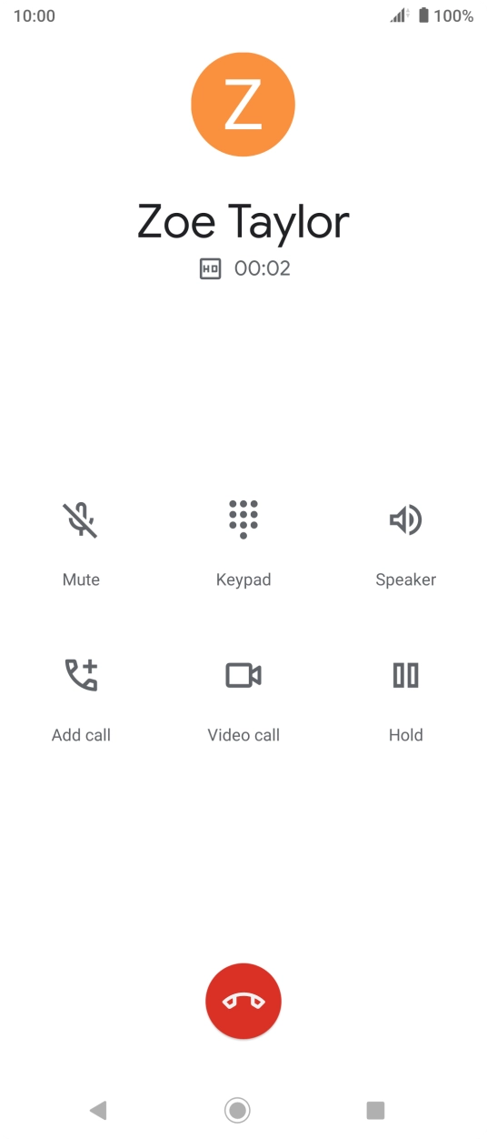 Press the end call icon.