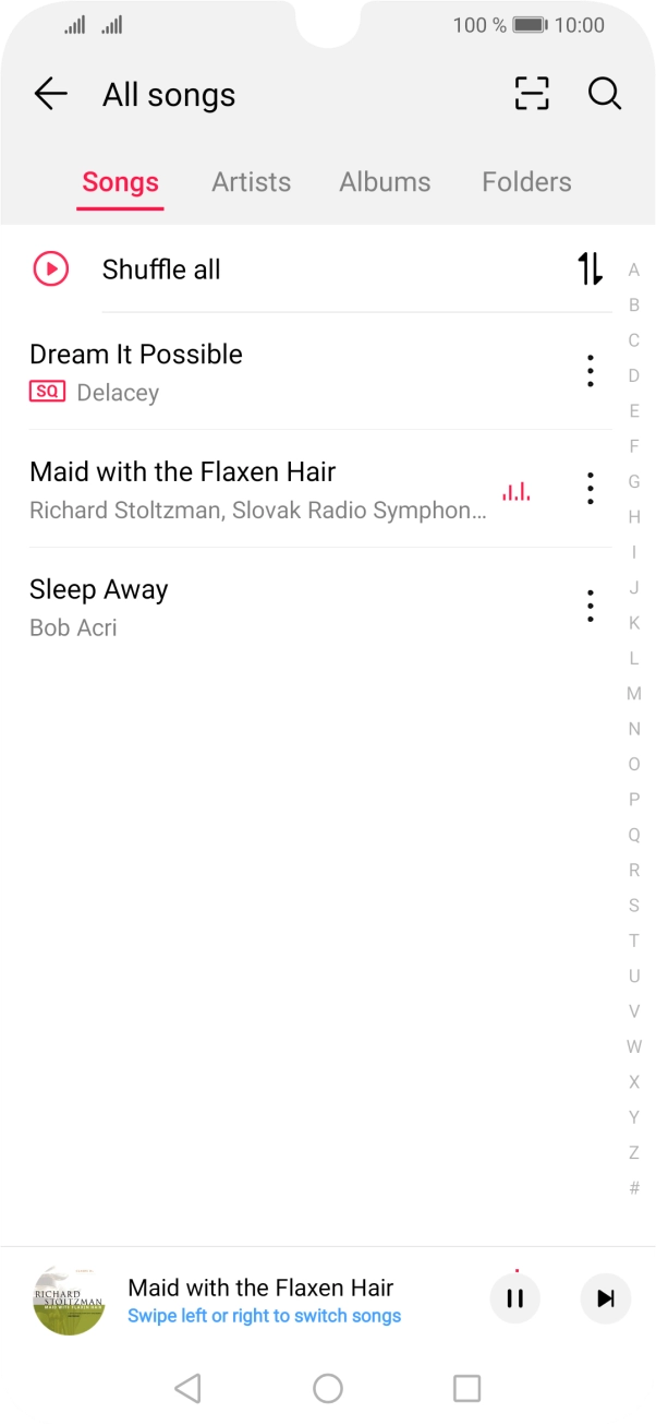 Press the song title at the bottom of the screen.