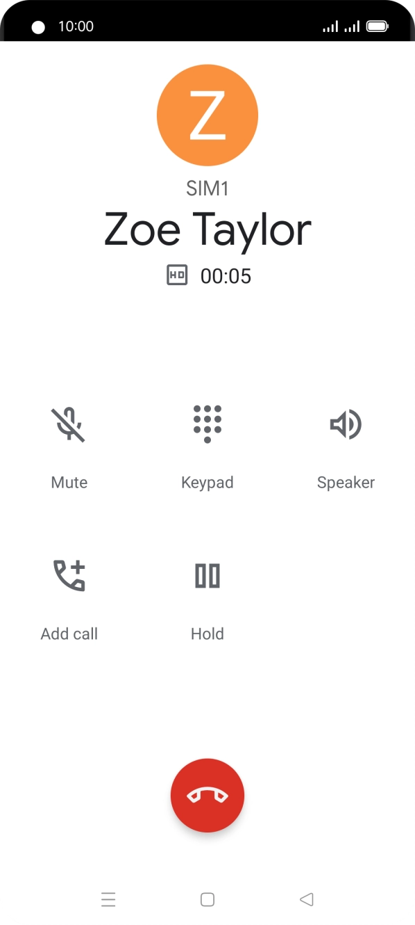 Press the end call icon.