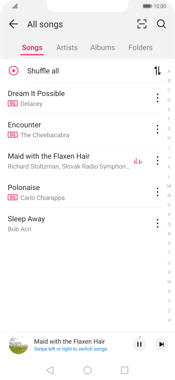 Press the song title at the bottom of the screen.
