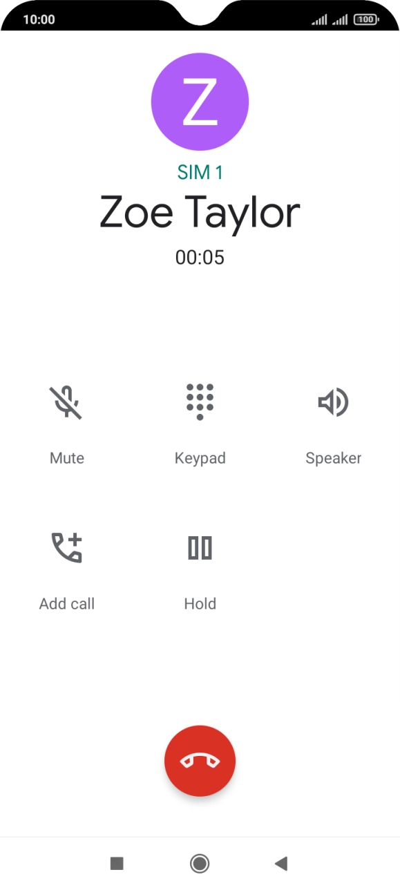 Press the end call icon.