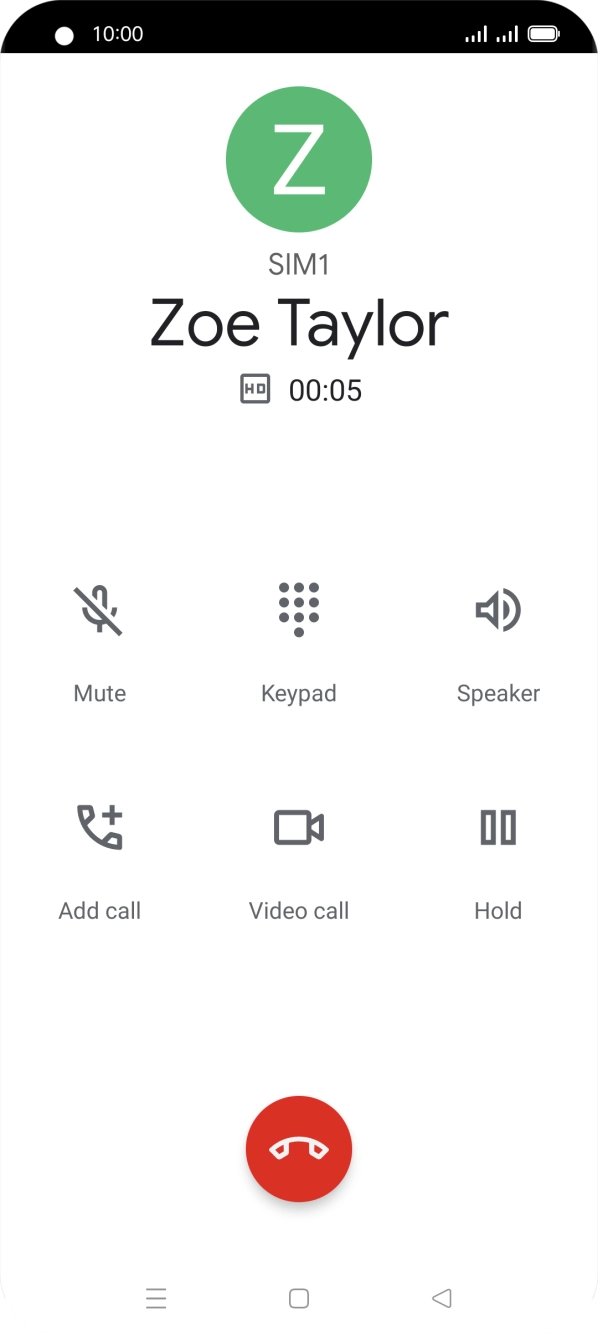 Press the end call icon.