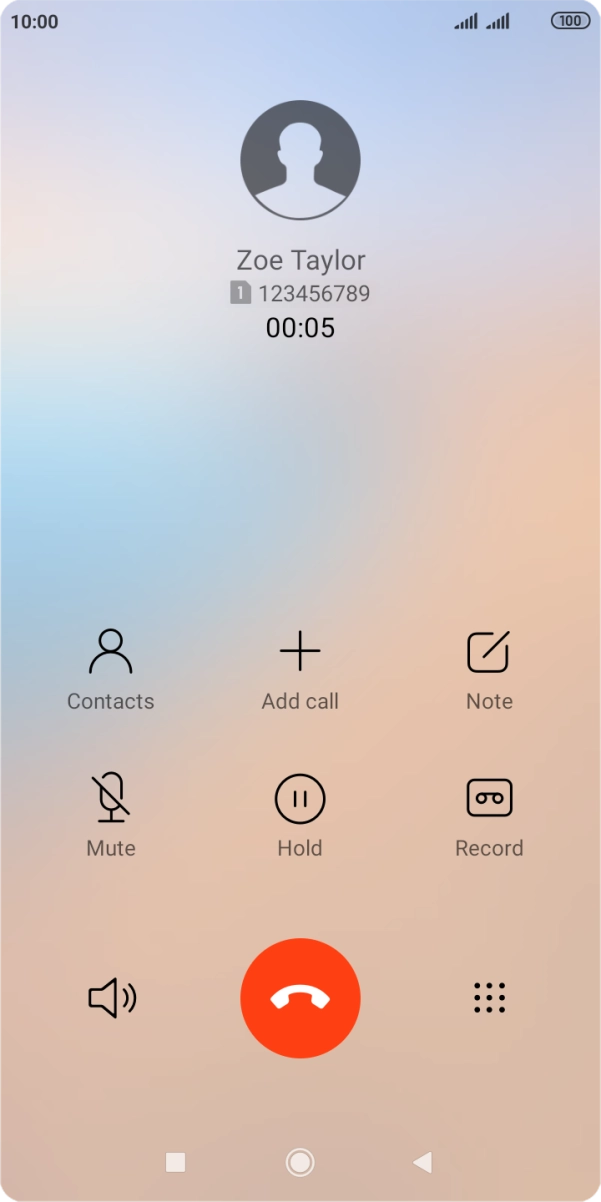 Press the end call icon.