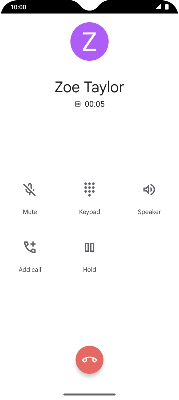 Press the end call icon.