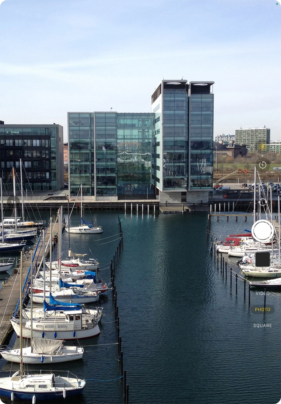 Slide your finger up or down on the screen to select the required camera mode.