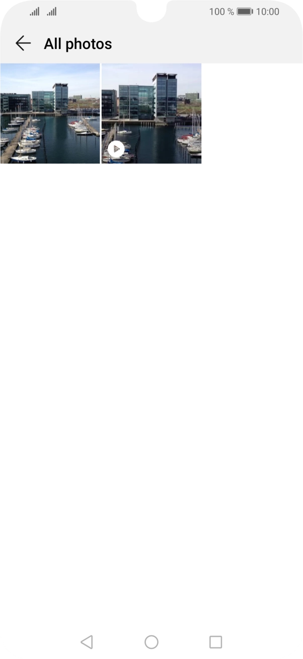 Press and hold any picture or video clip.