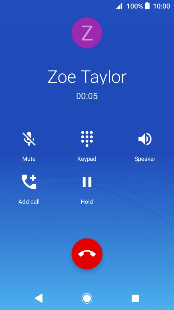 Press the end call icon.