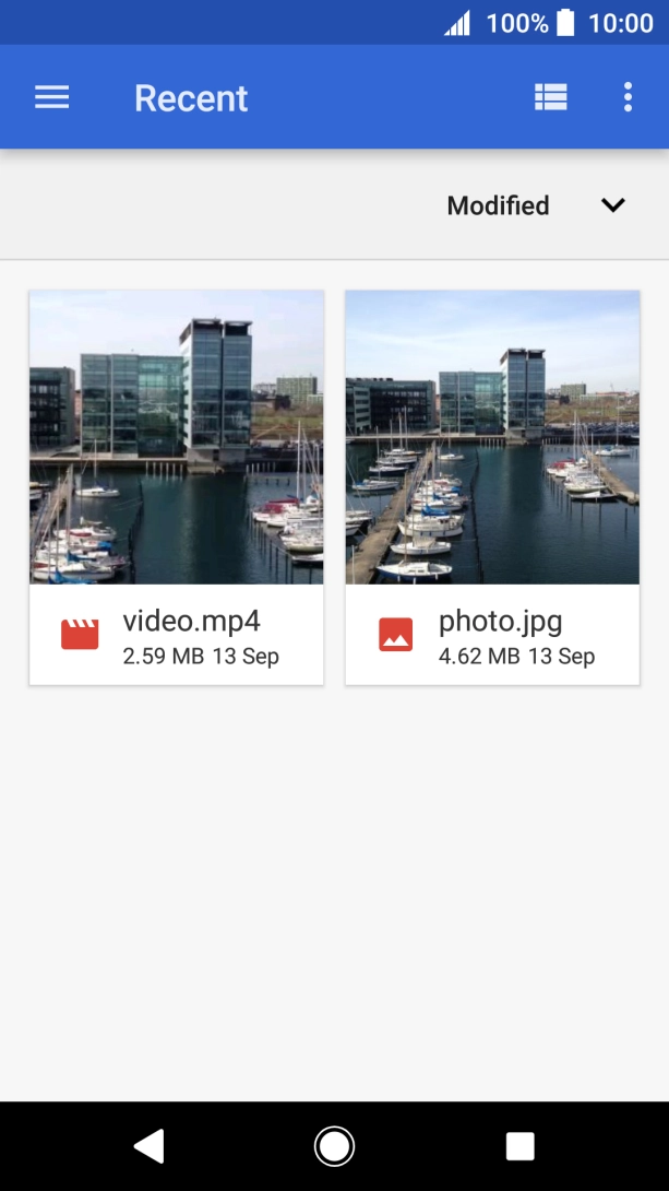 Slide your finger right starting from the left side of the screen.