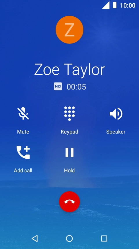 Press the end call icon.