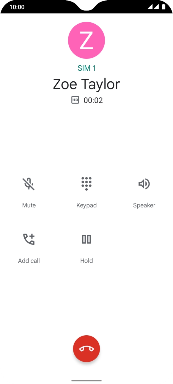Press the end call icon.