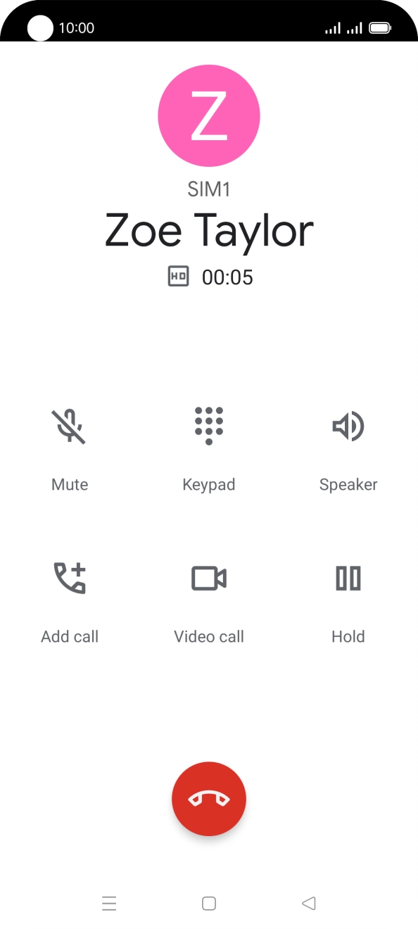 Press the end call icon.