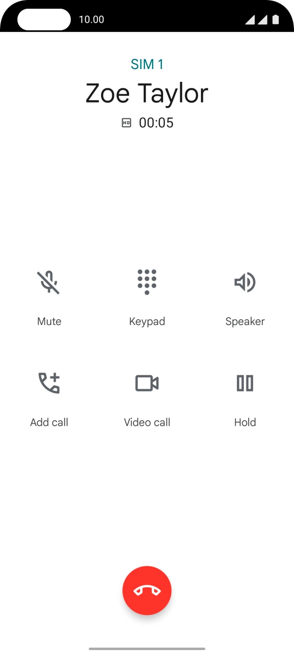 Press the end call icon.