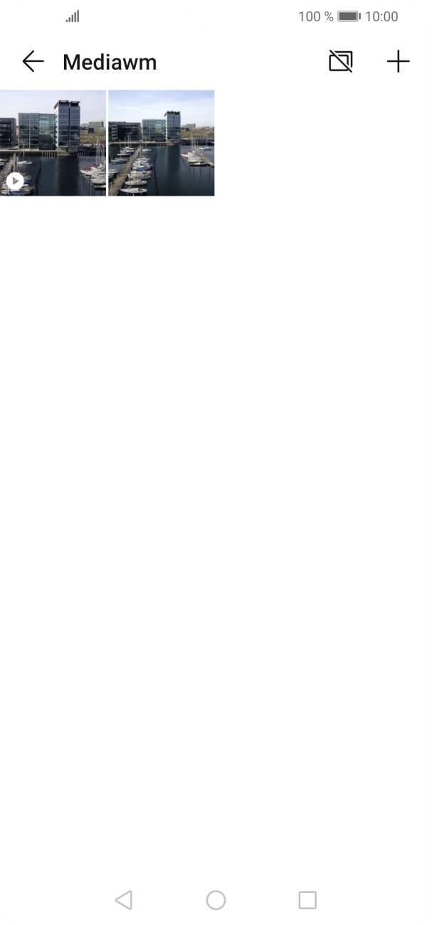 Press and hold the required picture or video clip. Press and hold the required picture or video clip.