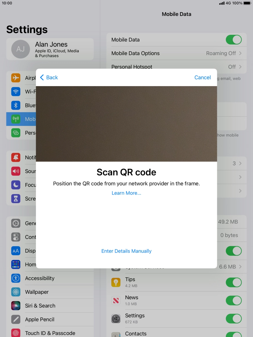 Place the QR code you've received inside the tablet camera frame to scan the code.