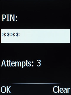 Key in your SIM PIN and press the Navigation key. The default SIM PIN is 0000.