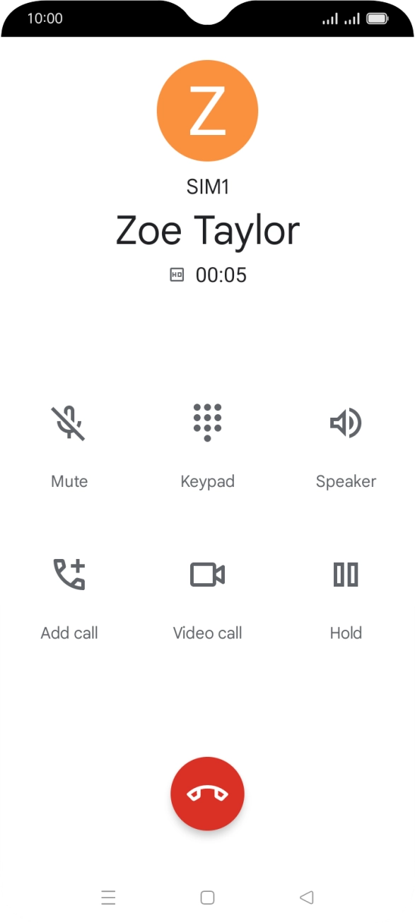 Press the end call icon.