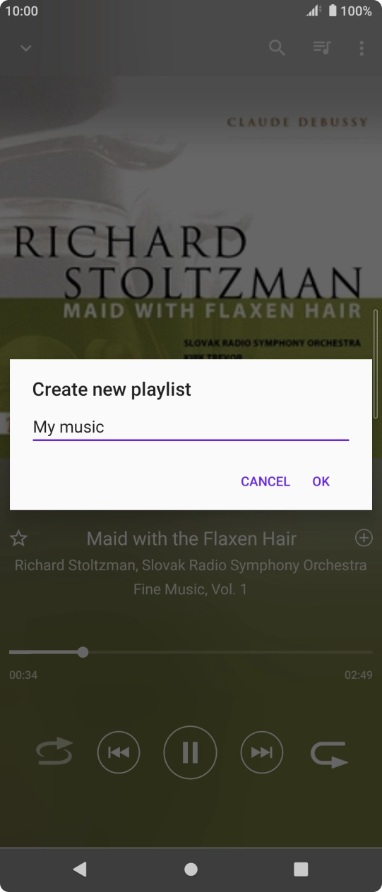 Key in a name for the playlist and press OK. Key in a name for the playlist and press OK.