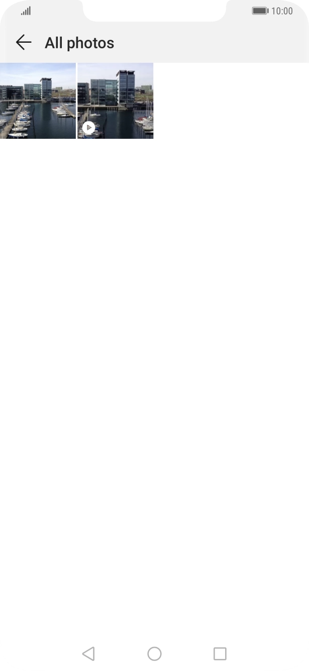 Press and hold any picture or video clip. Press and hold any picture or video clip.