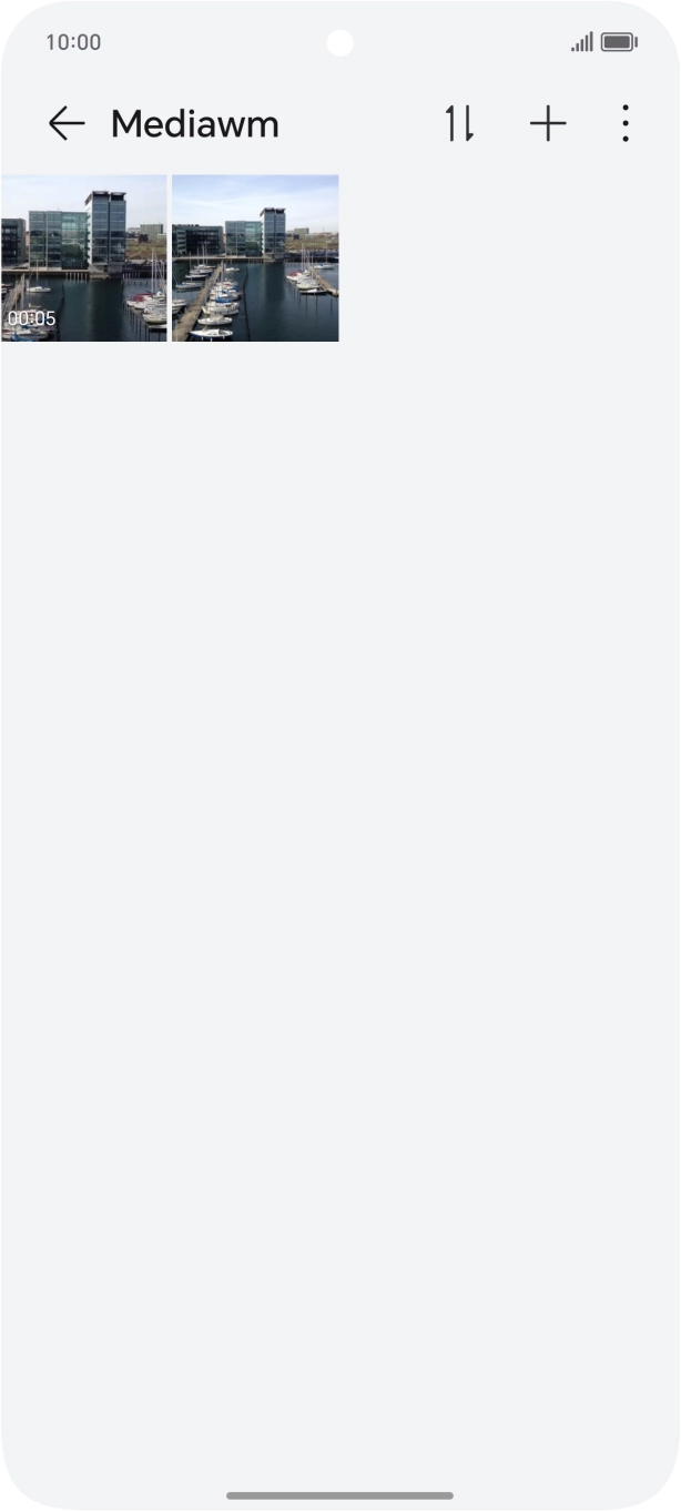 Press and hold any picture or video. Press and hold any picture or video.