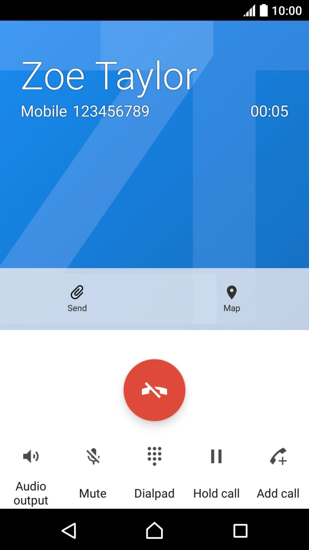 Press the end call icon.