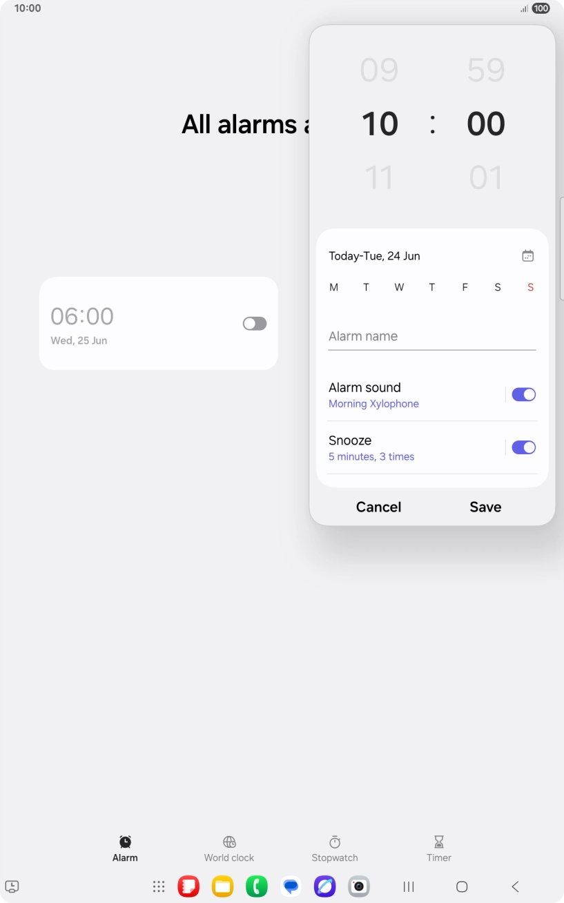 Slide your finger up or down on the hour and minute numbers to set the required alarm time.