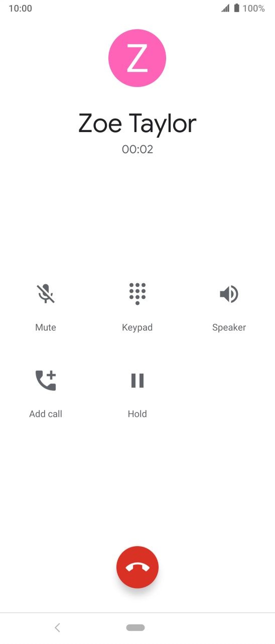 Press the end call icon.
