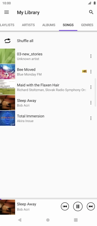 Press the song title at the bottom of the screen.