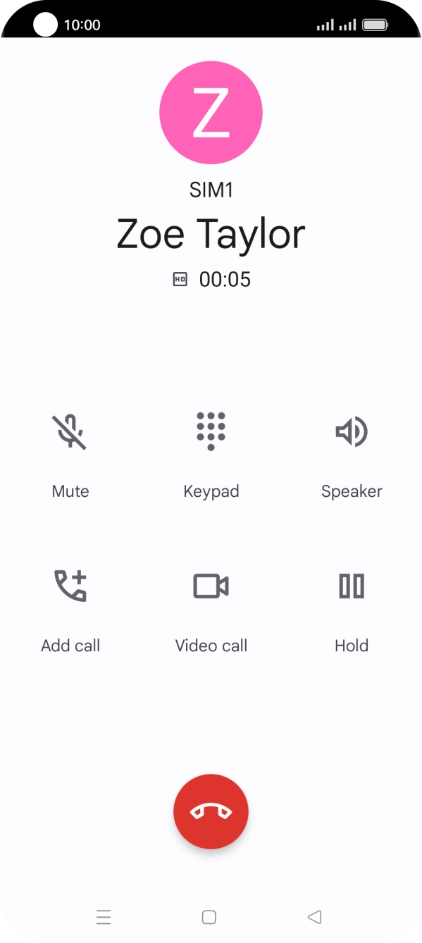 Press the end call icon.