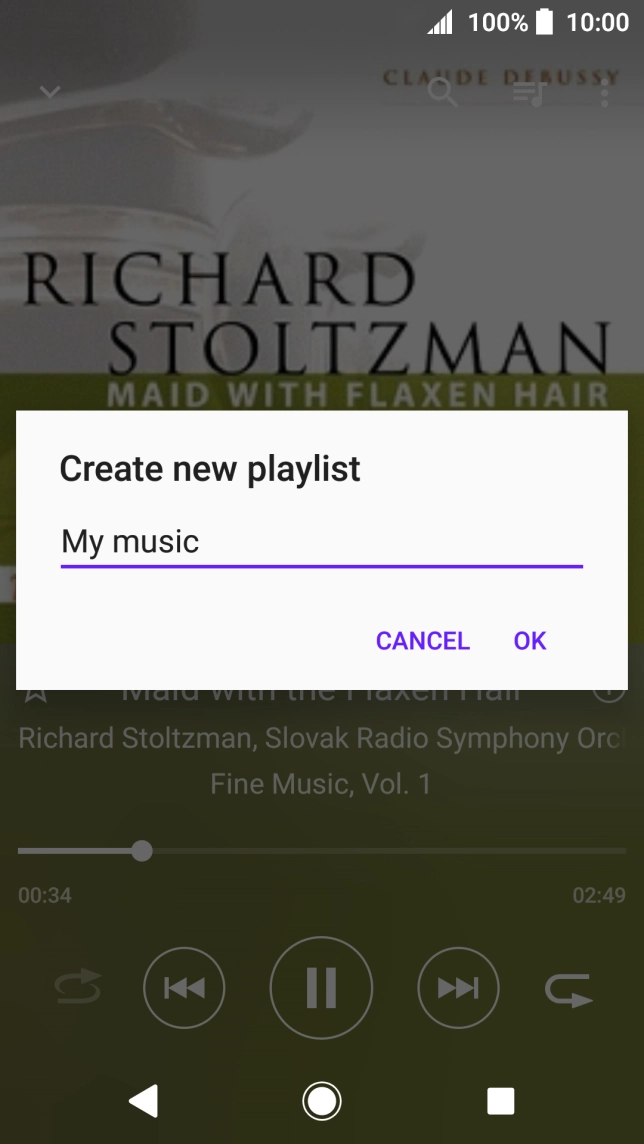 Key in a name for the playlist and press OK.