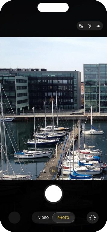 Slide your finger right or left on the screen to select the required camera mode.